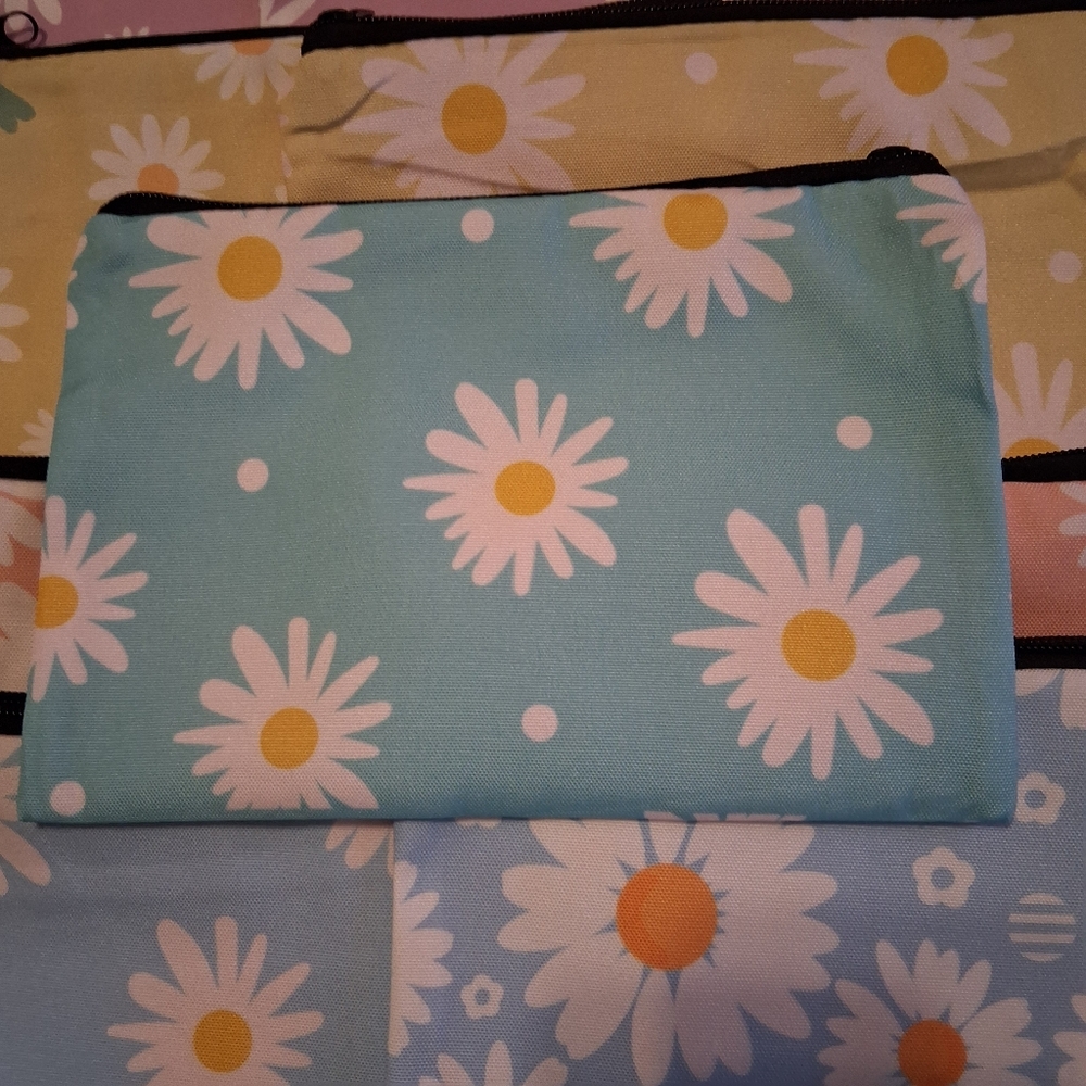 Bundle of 9 Makeup Bags.  Pastel Colors With Fliwers